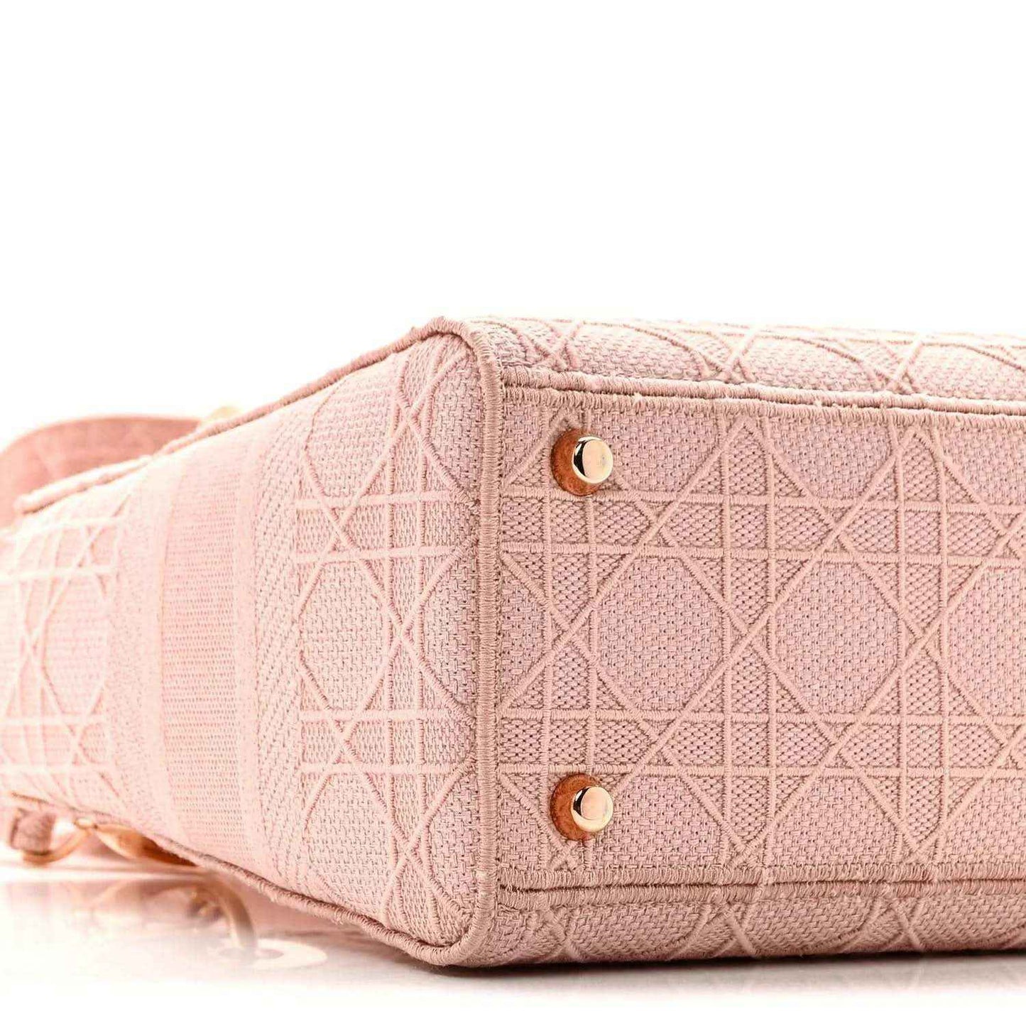 Pink canvas bag end with stitched panel and gold button closure