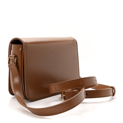 Bronze shiny calfskin flap crossbody bag with short strap and gold clasp