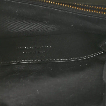 Black leather interior detail with zipper track and fine stitching lines