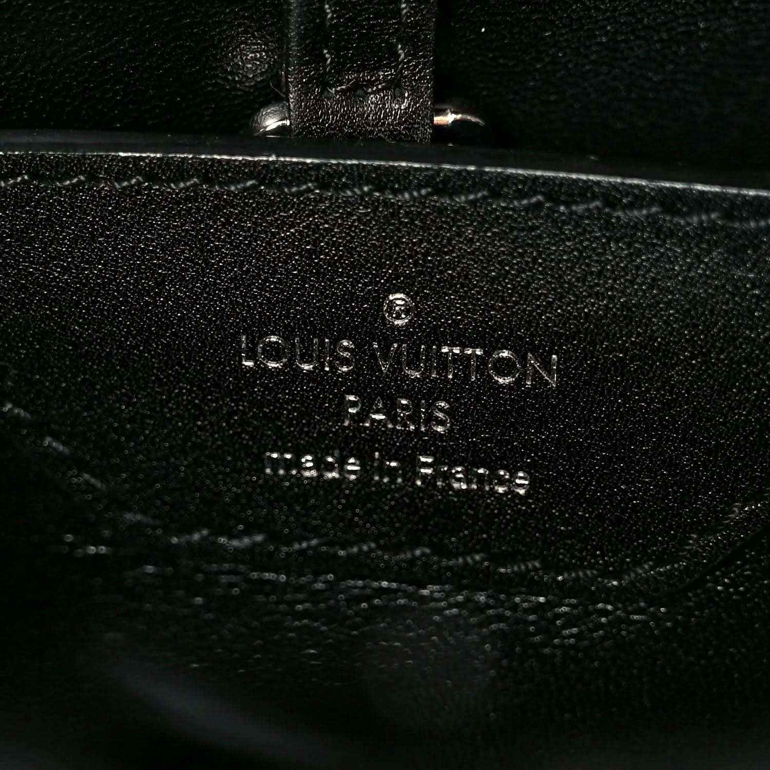 Louis Vuitton Paris made in France stamp on black leather lining