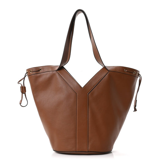 Tan-brown calfskin Y drawstring tote bag with top handles and side tie tabs