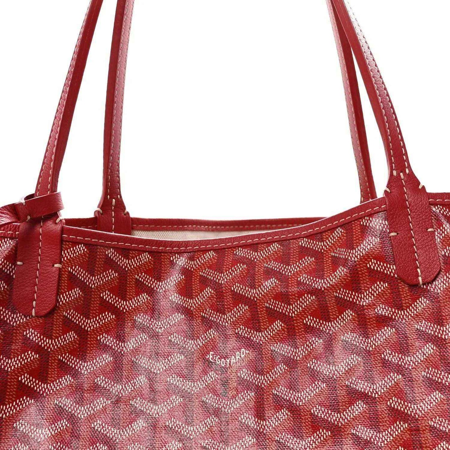 Red Goyardine canvas tote bag top with dual handles and logo patch.