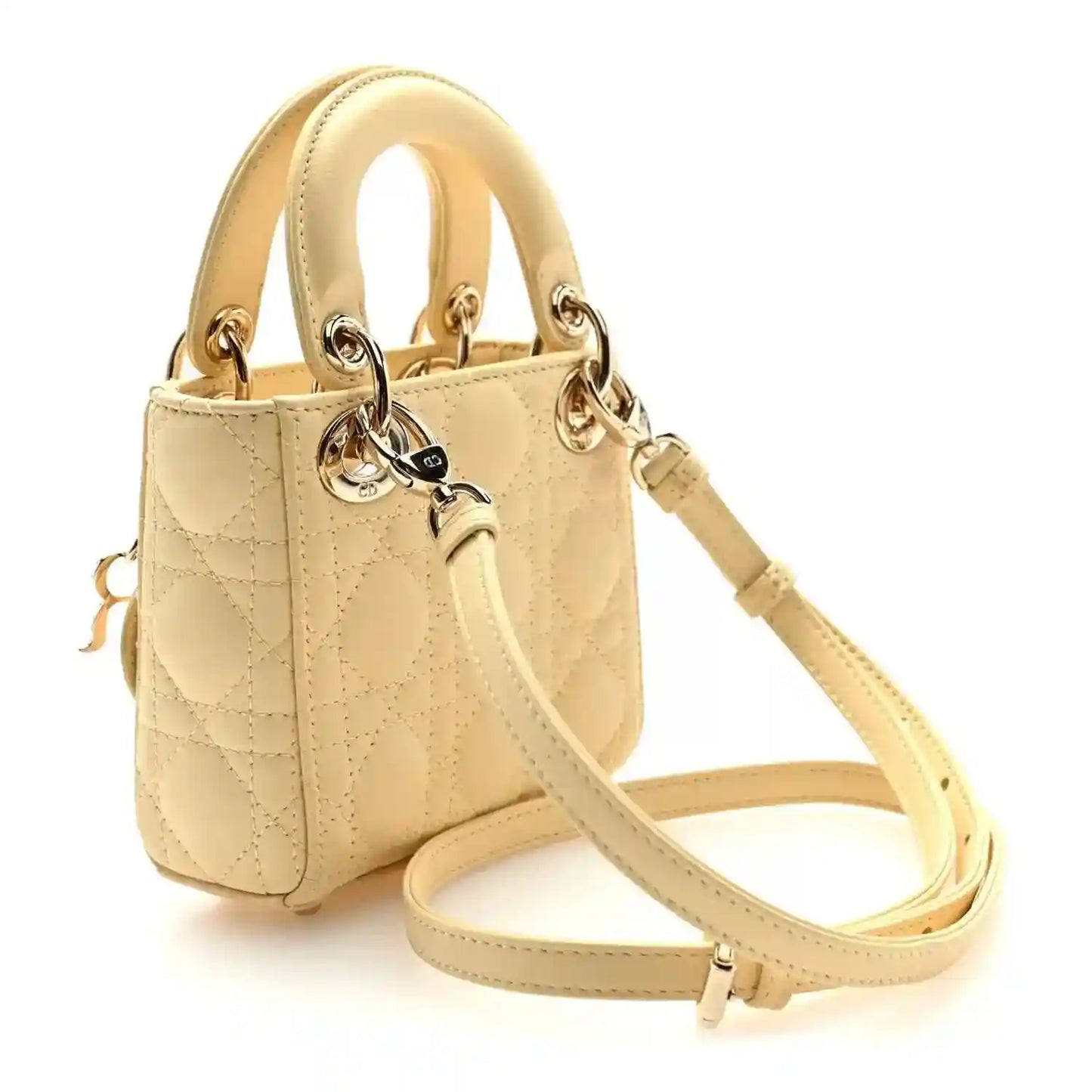 Micro Lady Dior handbag in soft yellow with top handles and adjustable shoulder strap