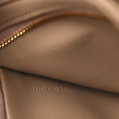 Close-up of embossed leather stamp on the bag interior