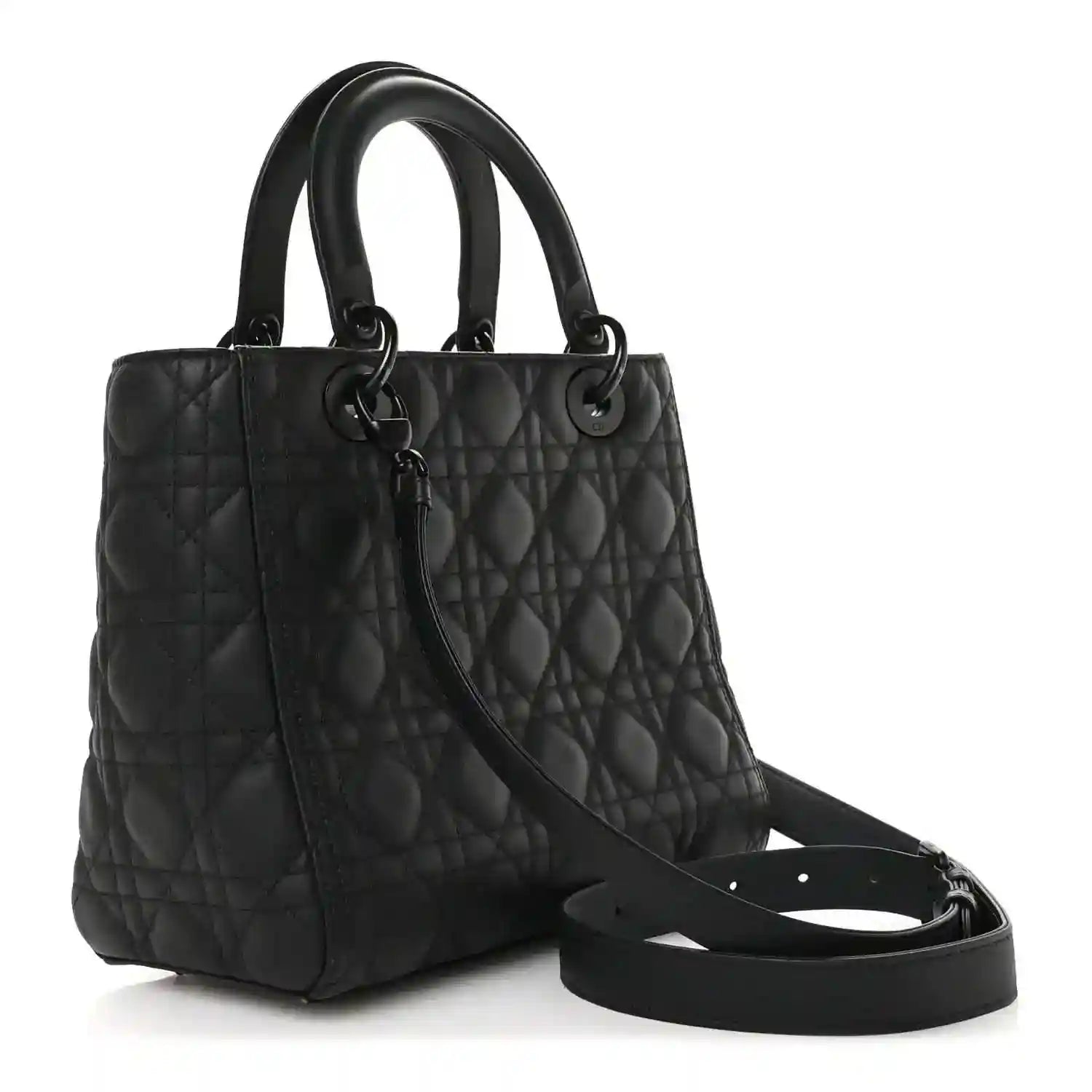 Black quilted Lady Dior bag with top handles and long shoulder strap, angled view