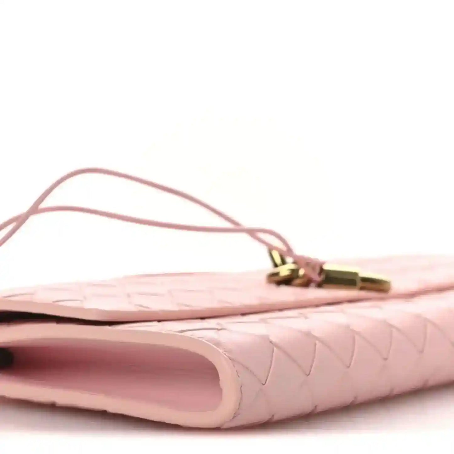 Bottega Veneta Rose pink intrecciato nappa clutch open with gold clasp hardware