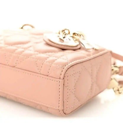Pink beige micro handbag corner with quilted cannage panels and gold-tone hardware detail