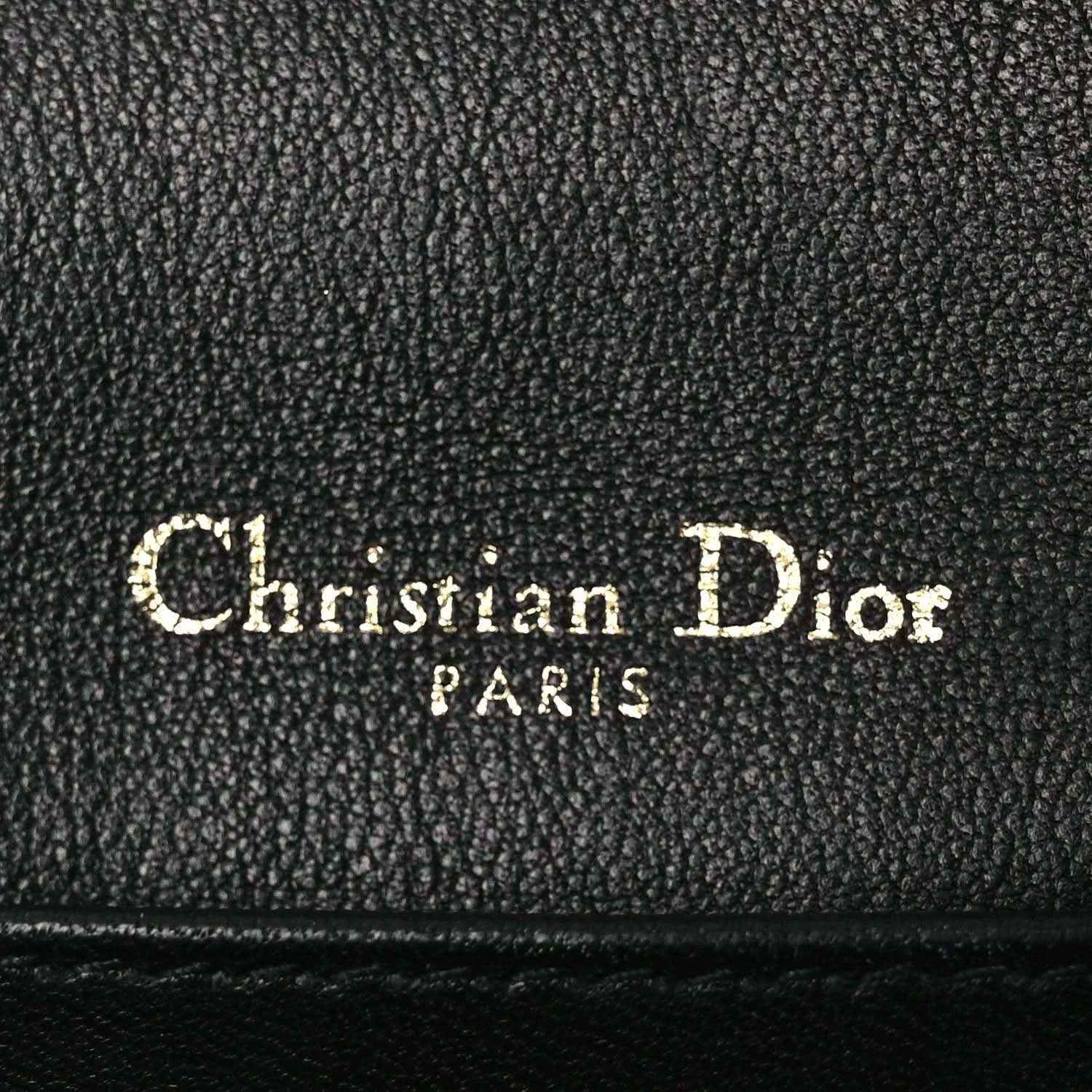 Black leather Lady Dior pouch lining label reading Christian Dior PARTS