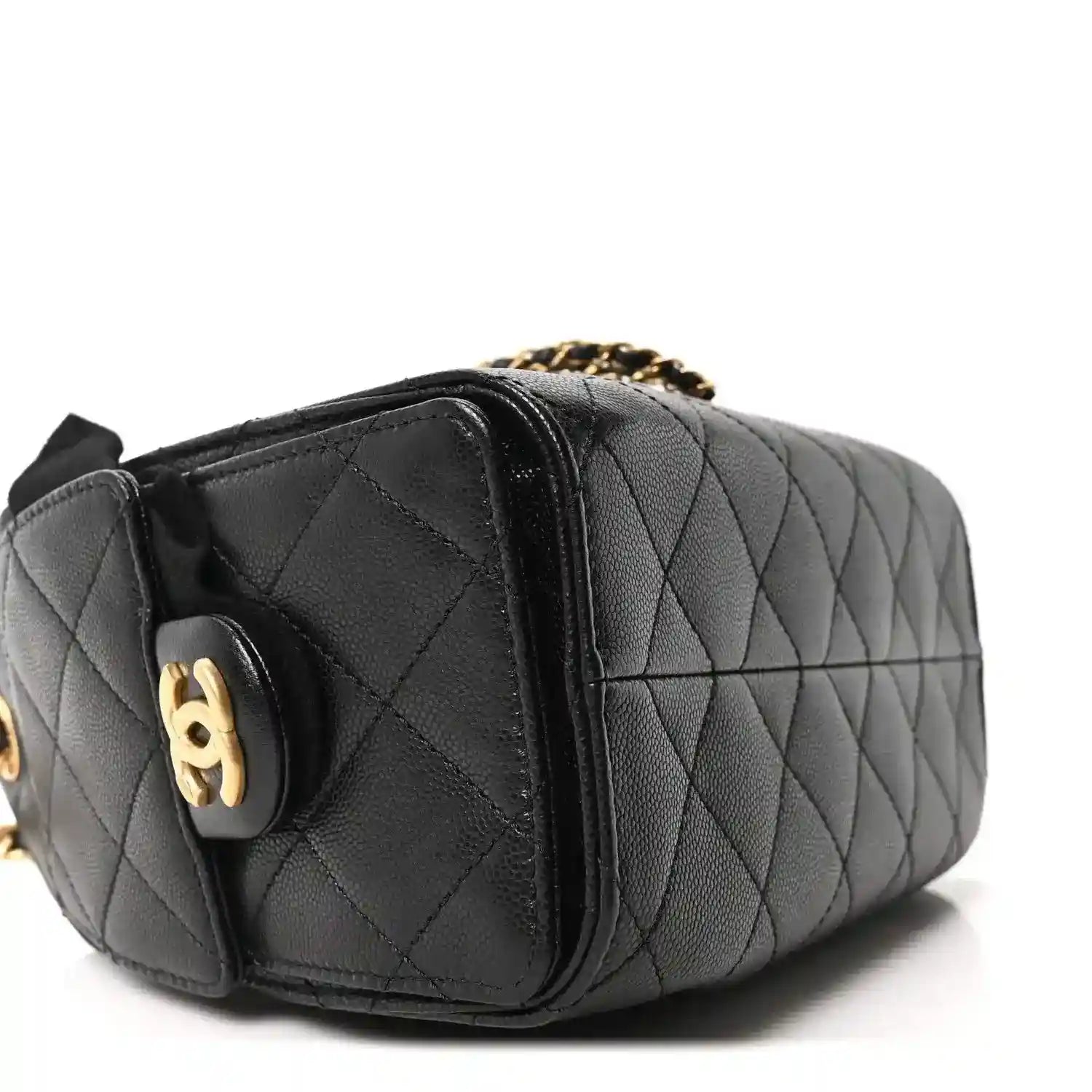 Black leather quilted mini handbag side panel with gold-toned CC emblem