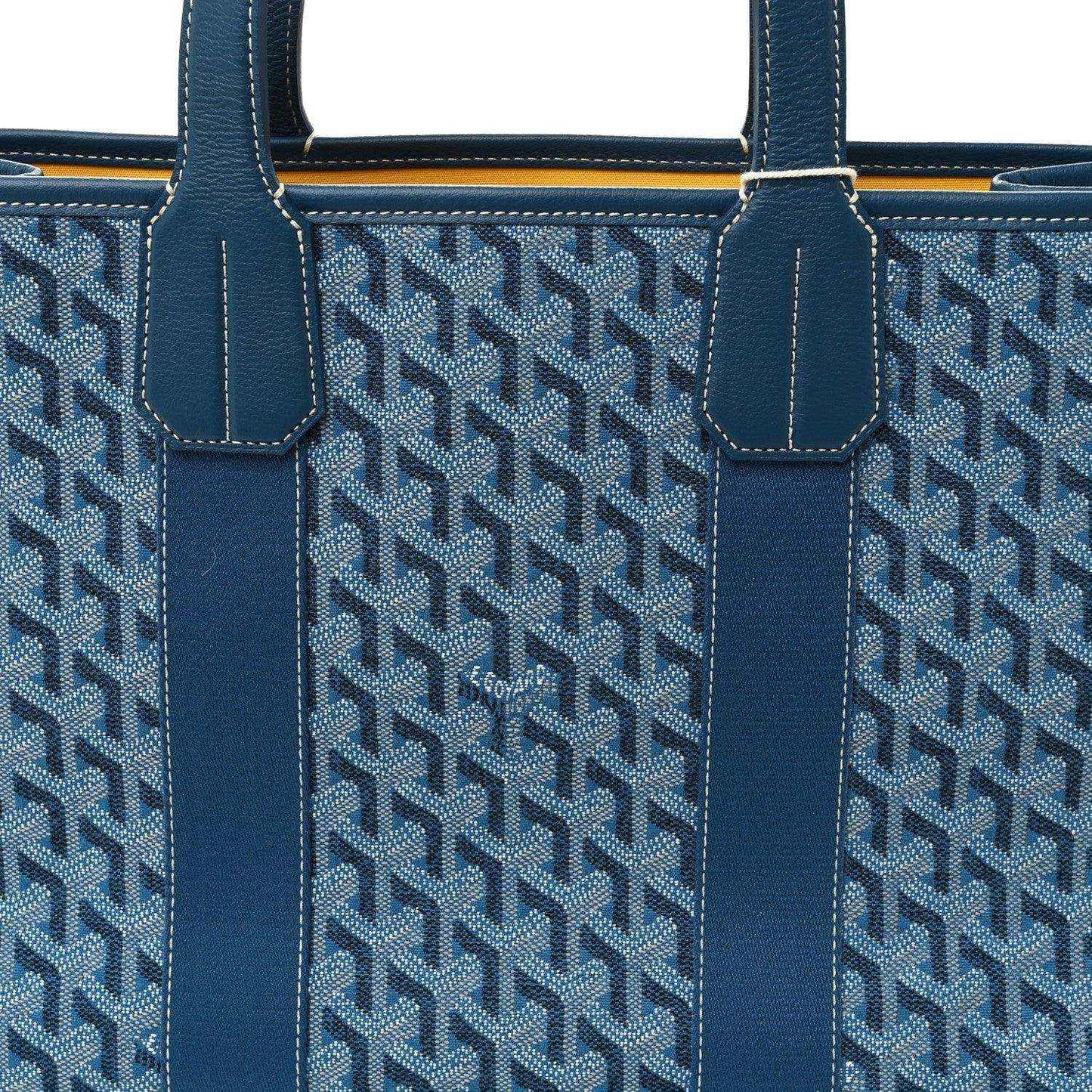 Ocean blue Villette PM tote front close-up with Goyardine pattern and handle attachments.