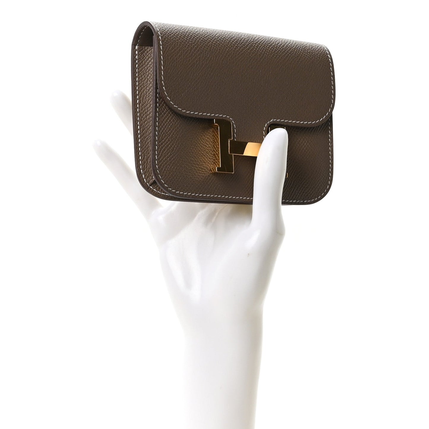 Hermes Constance slim wallet, etoupe textured leather, gold H clasp, side view