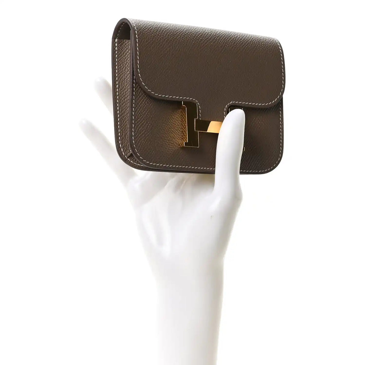 Hermes Constance slim wallet, etoupe textured leather, gold H clasp, side view
