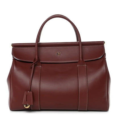 Loro Piana calfskin loom bag in dark brown with top handles and front snap flap