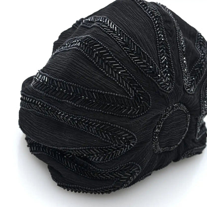 Black beaded side panel pochon bag with textured pleats and broderie detail