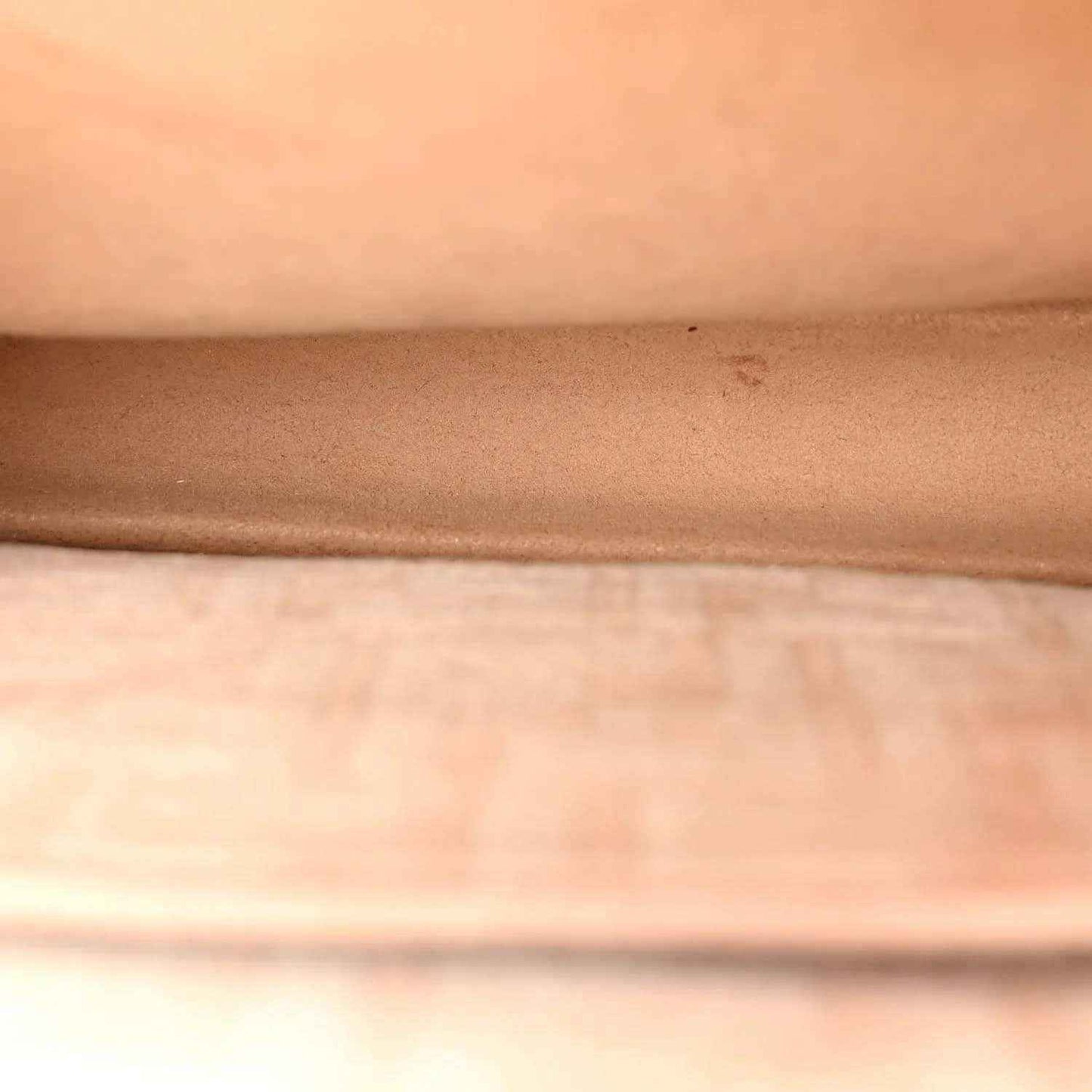 Fendi satchel bag close-up of beige suede-like fabric texture