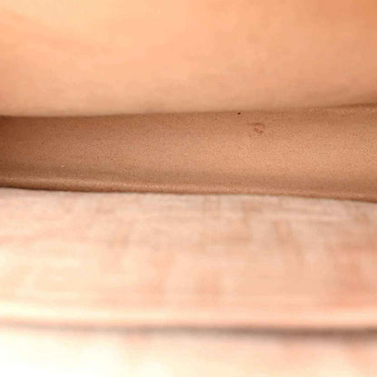 Fendi satchel bag close-up of beige suede-like fabric texture