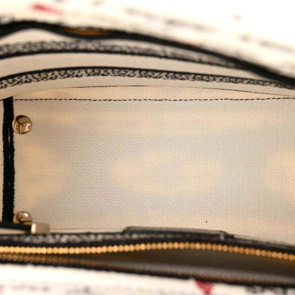 Medium Lady D-Lite bag interior view with stitched trim and zipper hardware