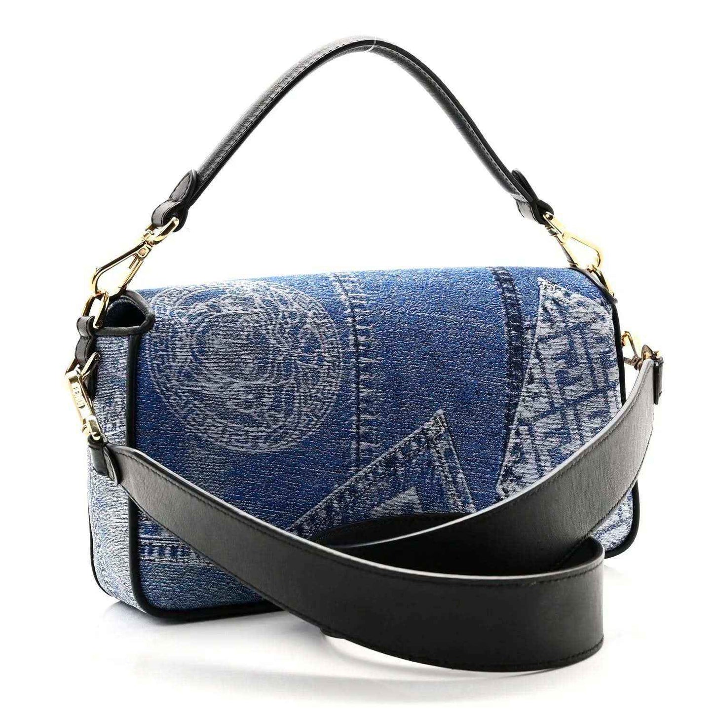 Blue denim patchwork baguette bag with black bottom strap, gold hardware, top handle