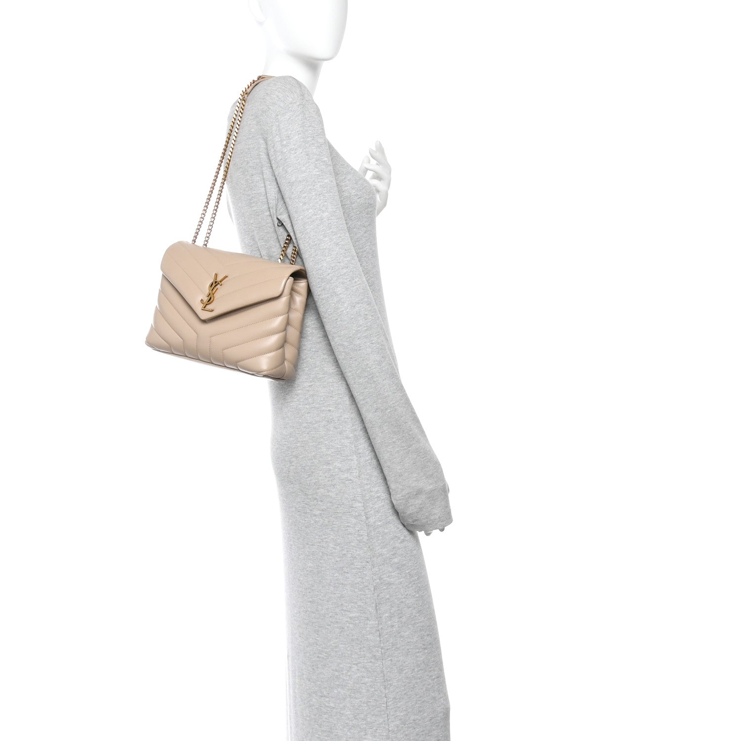 Small dark beige quilted chain satchel worn crossbody by model