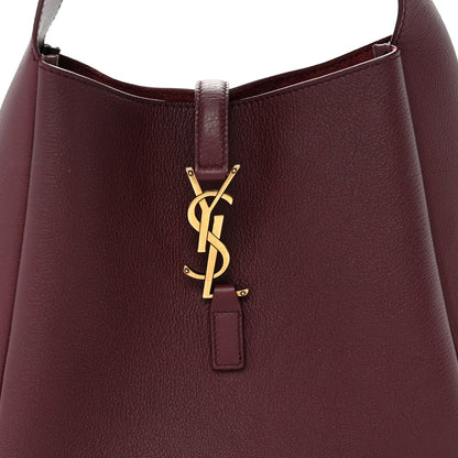 Smooth burgundy hobo bag front with gold YSL logo and leather pull tab