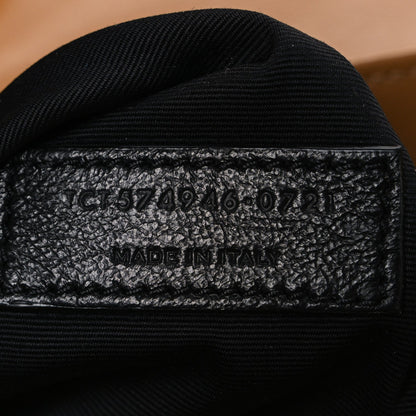 Black fabric interior stamp with code and “MADE IN ITALY” text