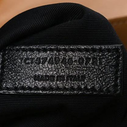 Black fabric interior stamp with code and “MADE IN ITALY” text