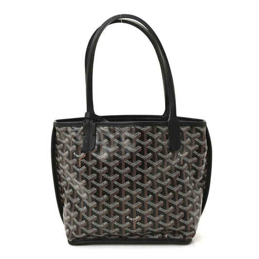 Reversible mini tote bag front view with black-and-gray patterned canvas and black leather trim