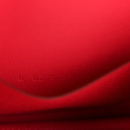 Hermes slim wallet rose red textured leather with subtle embossed marks