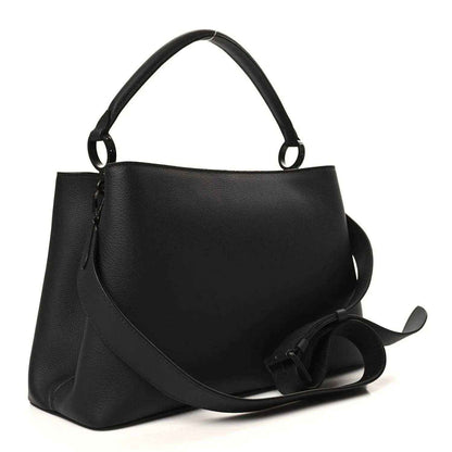 Black matte leather handbag with curved top handles, LV logo, and long strap