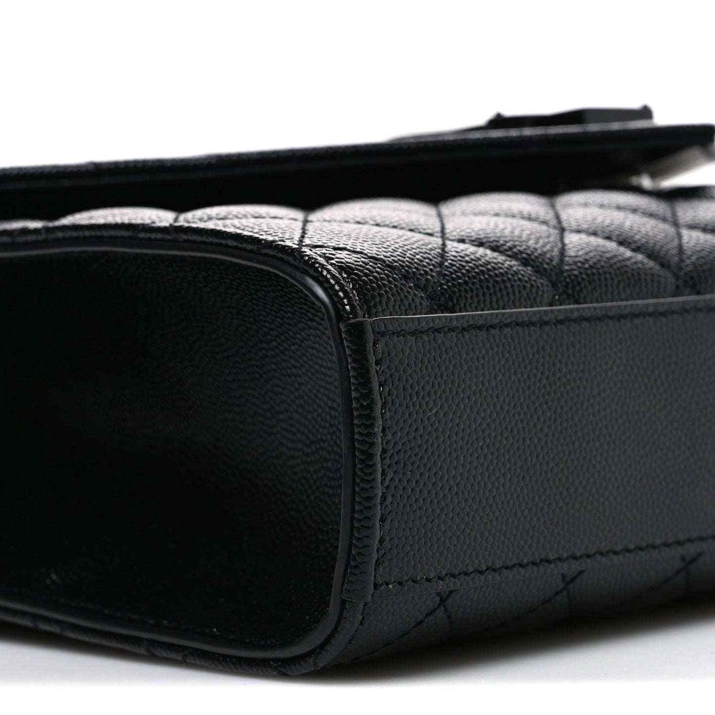 Saint Laurent black quilted satchel back corner with leather trim and stitched seam