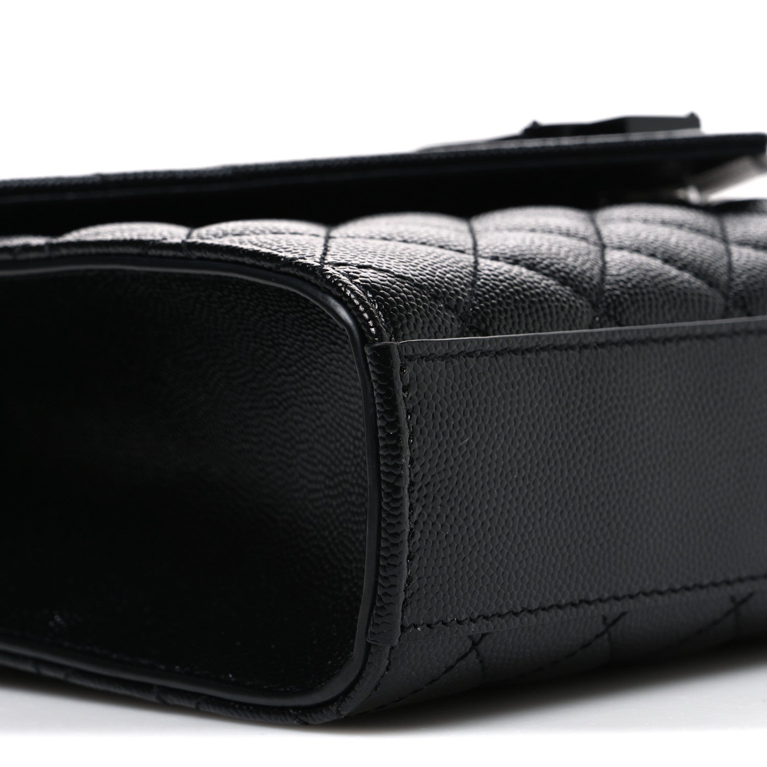 Saint Laurent black quilted satchel back corner with leather trim and stitched seam