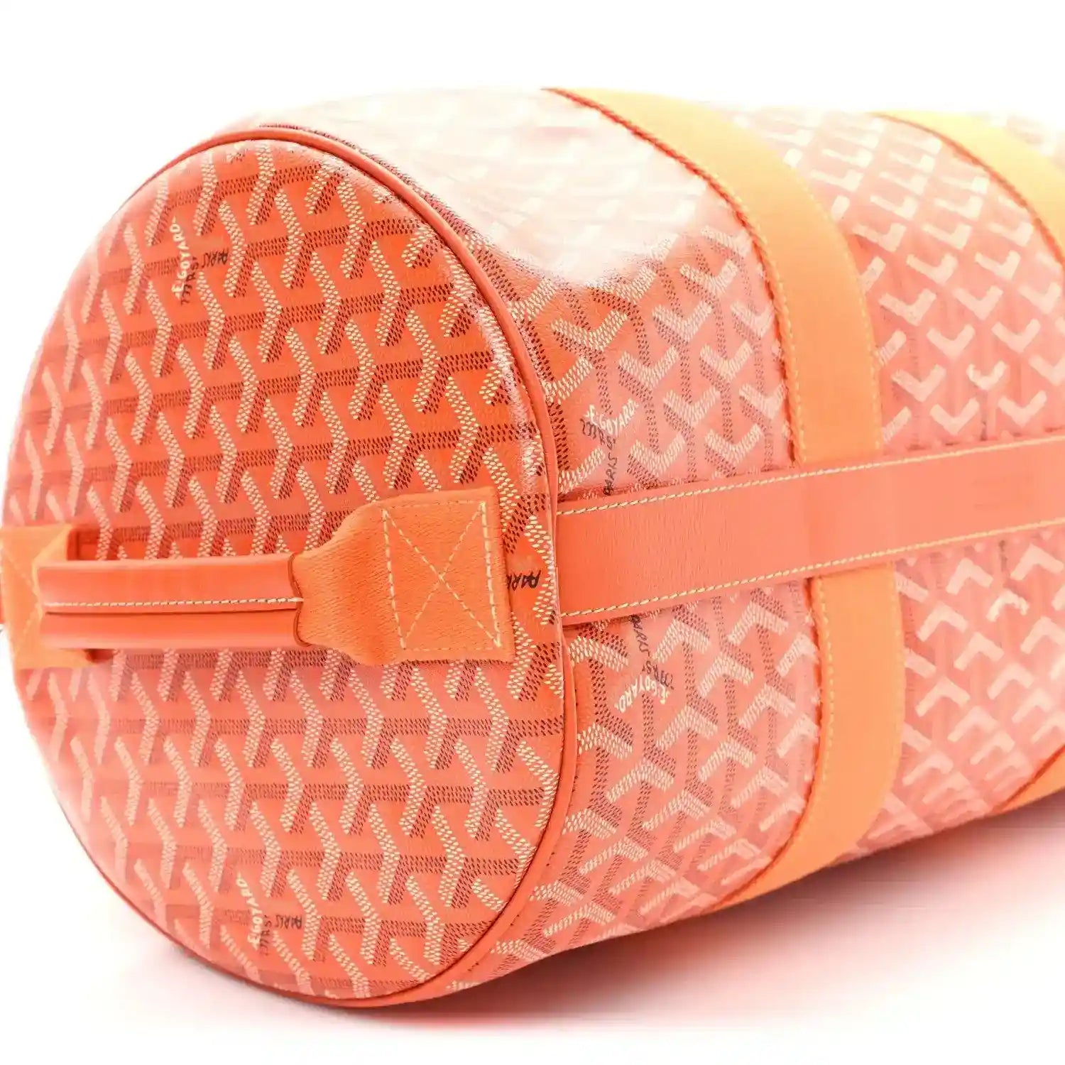 Orange monogram canvas barrel sports bag with zippered end compartment and tab.