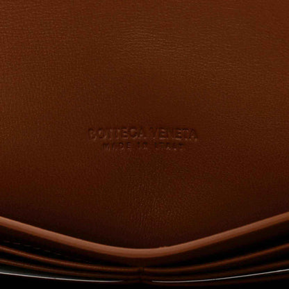 Brown suede clutch interior with BOTTEGA VENETA embossed logo