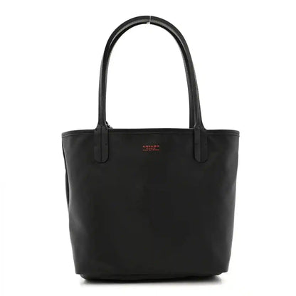 Reversible Goyard mini Anjou tote bag in solid black with leather handles