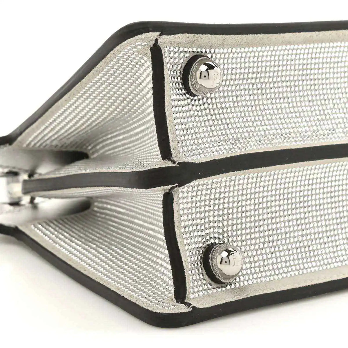 Petite Peekaboo satchel bag close-up of crystal front panels with metal logo emblems