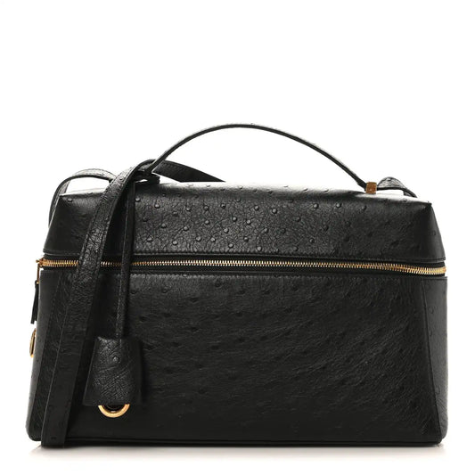 Black ostrich leather top-handle bag with front zipper and gold-tone hardware.