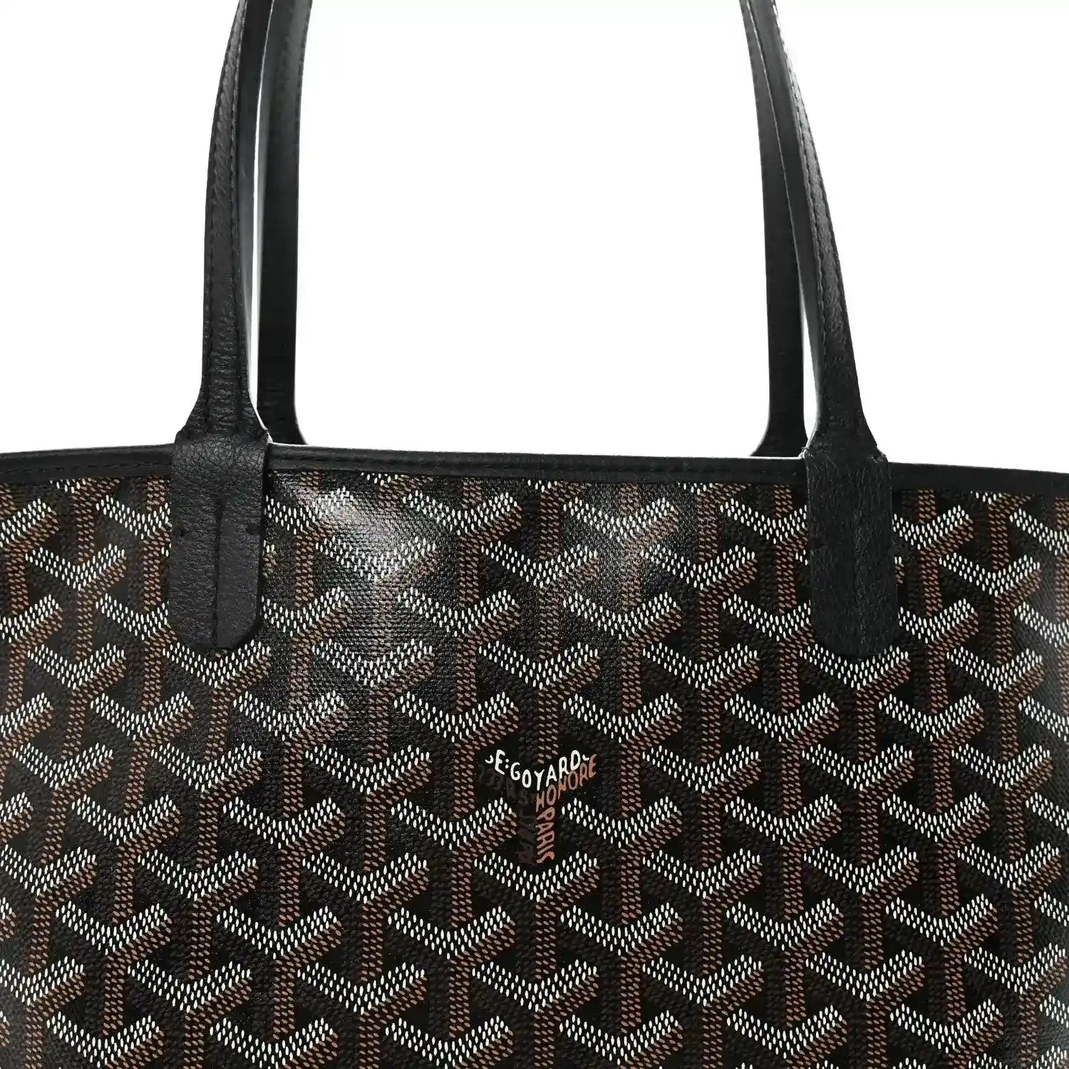 Goyardine tote bag front with black handles and small brand patch.