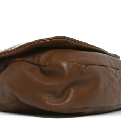 Lambskin shoulder bag top edge and quilted texture, light brown with curved seam