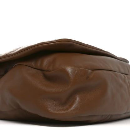 Lambskin shoulder bag top edge and quilted texture, light brown with curved seam