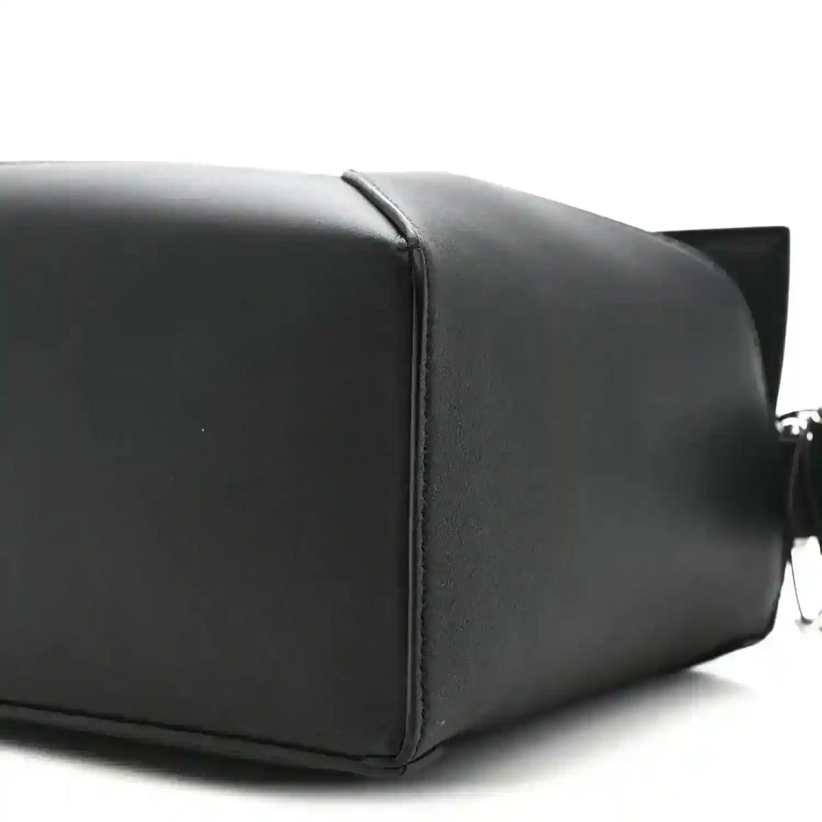 Small black calfskin shoulder bag with structured panels and top handle