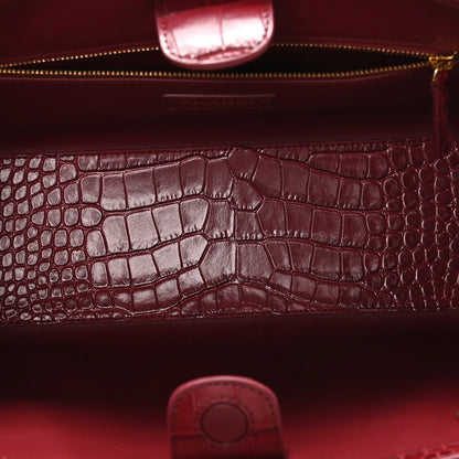 Small Chanel shopping bag croc-embossed interior pocket lining in dark red