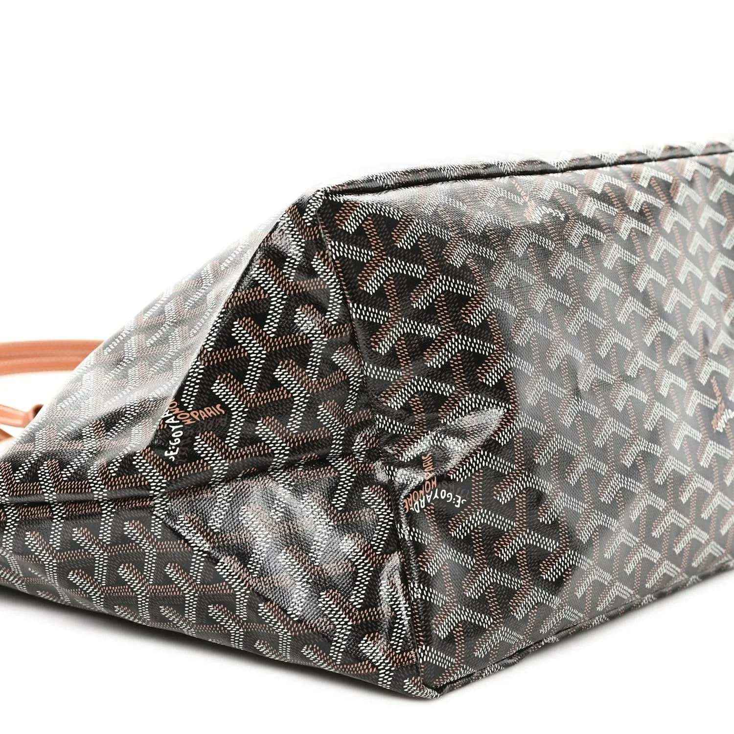 Black monogram tote bag corner with ruched top seam and tan trim