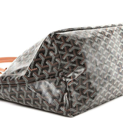 Black monogram tote bag corner with ruched top seam and tan trim
