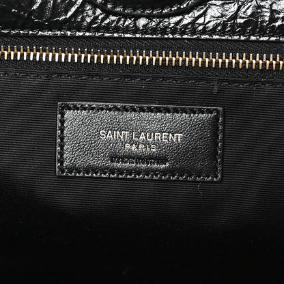 Black leather interior label with SAINT LAURENT PARIS text and gold zipper