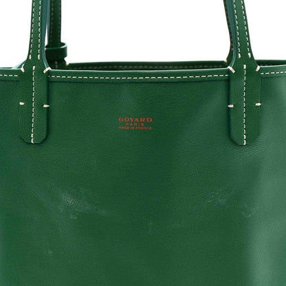 Green leather mini tote with front stitched panel and embossed logo