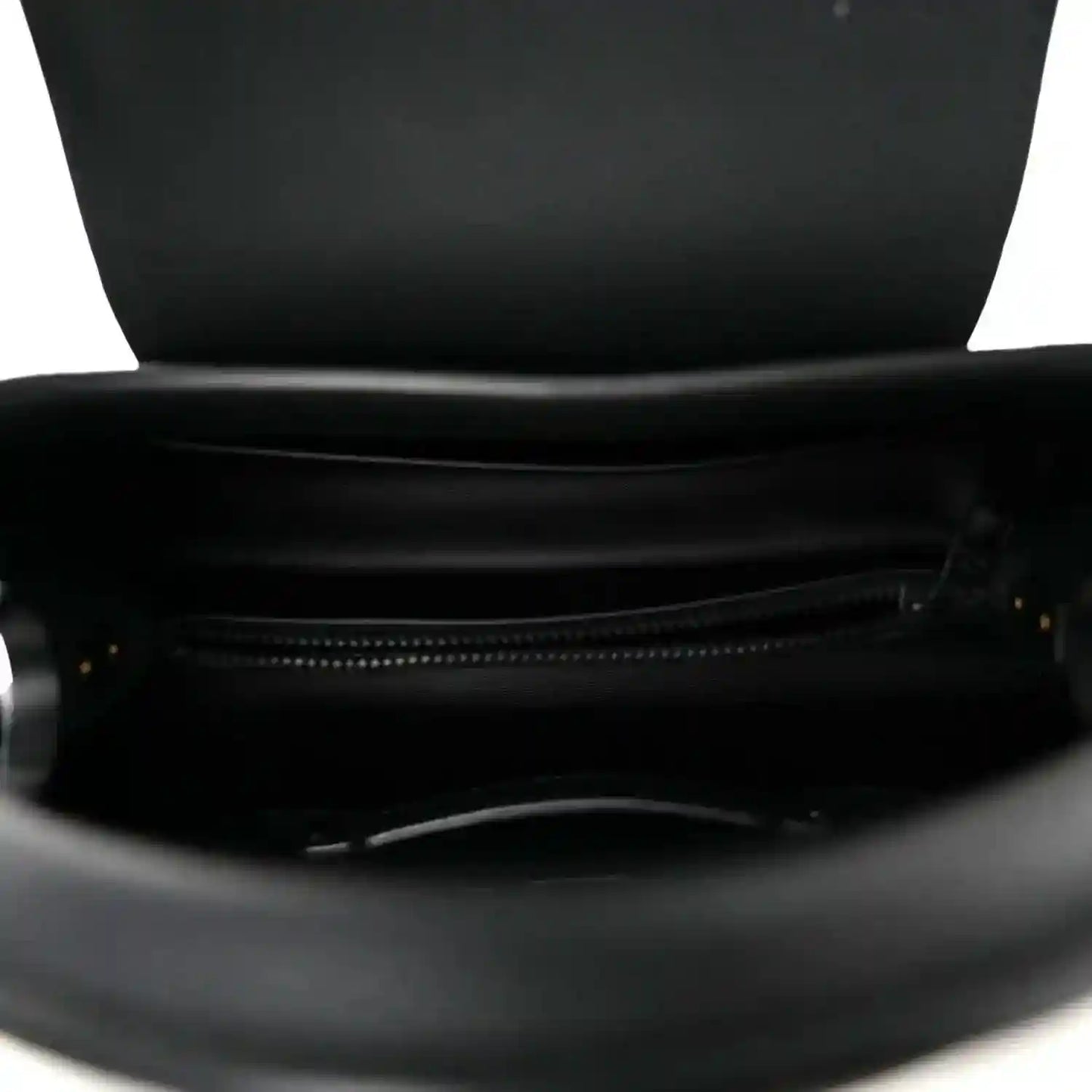 Matte black leather handbag with open top and visible zipper pocket