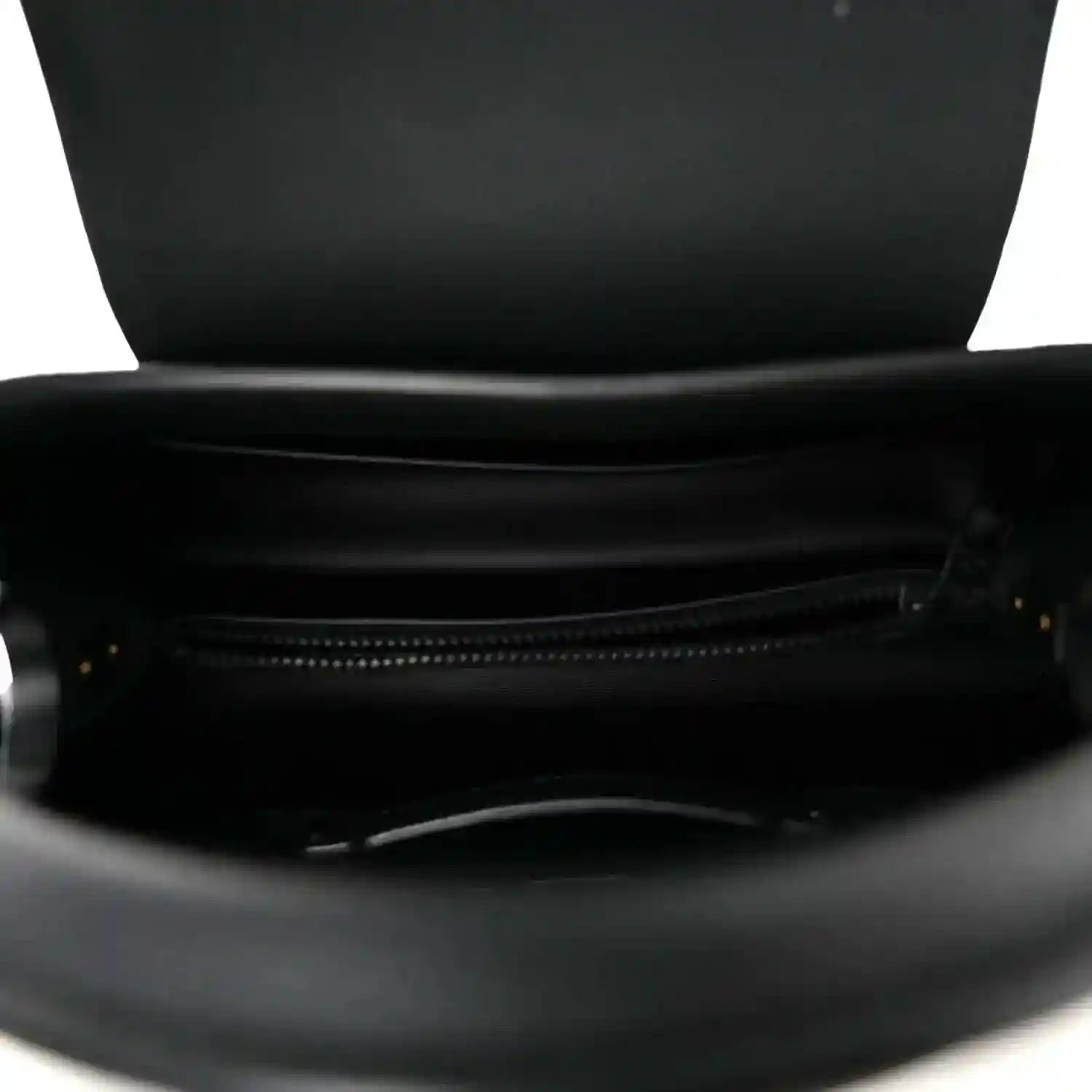 Matte black leather handbag with open top and visible zipper pocket