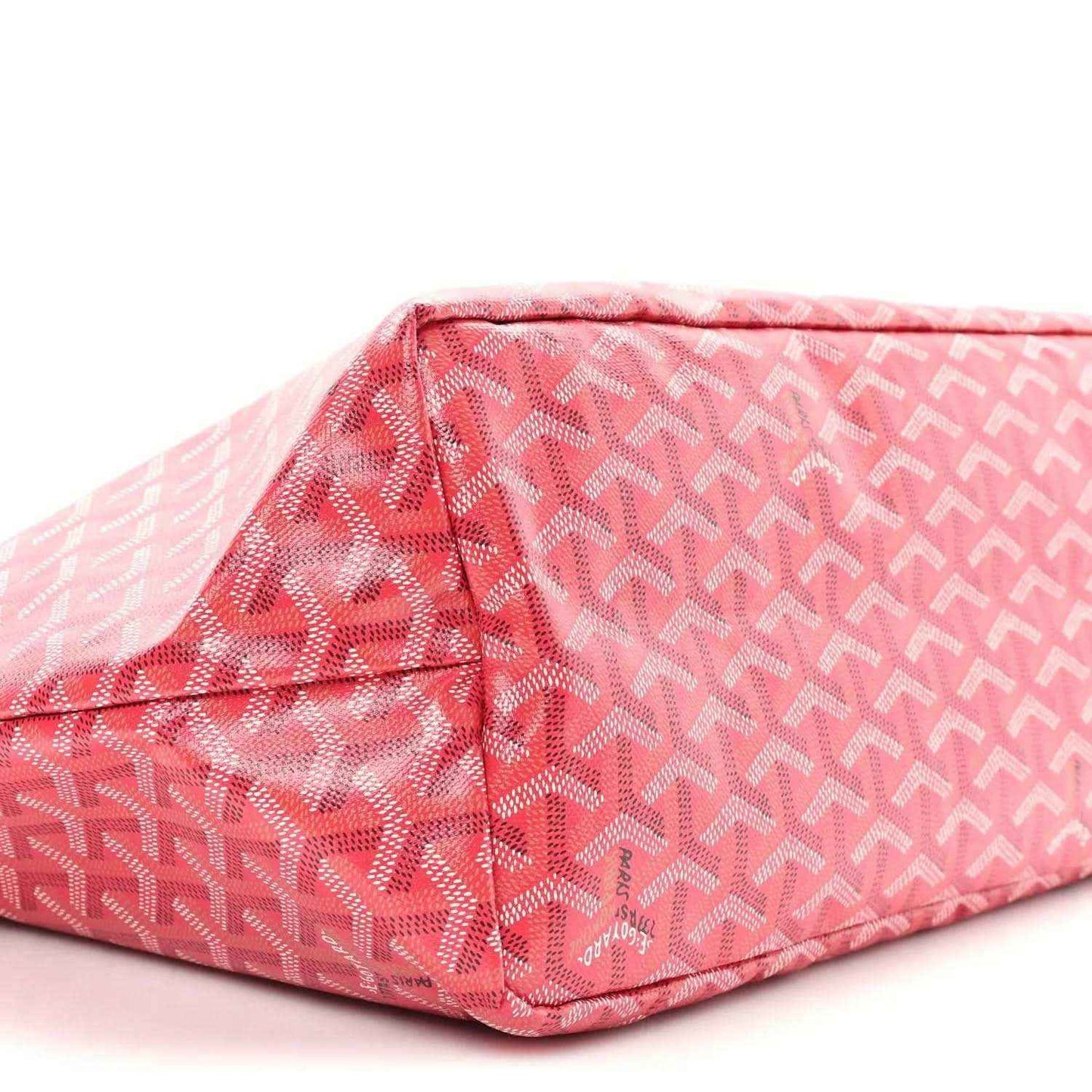 Fuchsia patterned tote bag bottom close-up showing side panel stitching and curved edge
