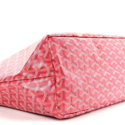 Fuchsia patterned tote bag bottom close-up showing side panel stitching and curved edge
