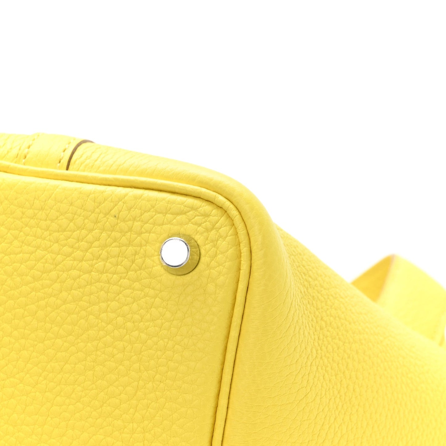 Lime yellow textured leather tote front button detail with edge stitching